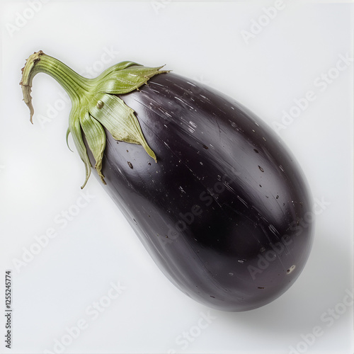 Single fresh eggplant with green calyx isolated on a clean white background. photo