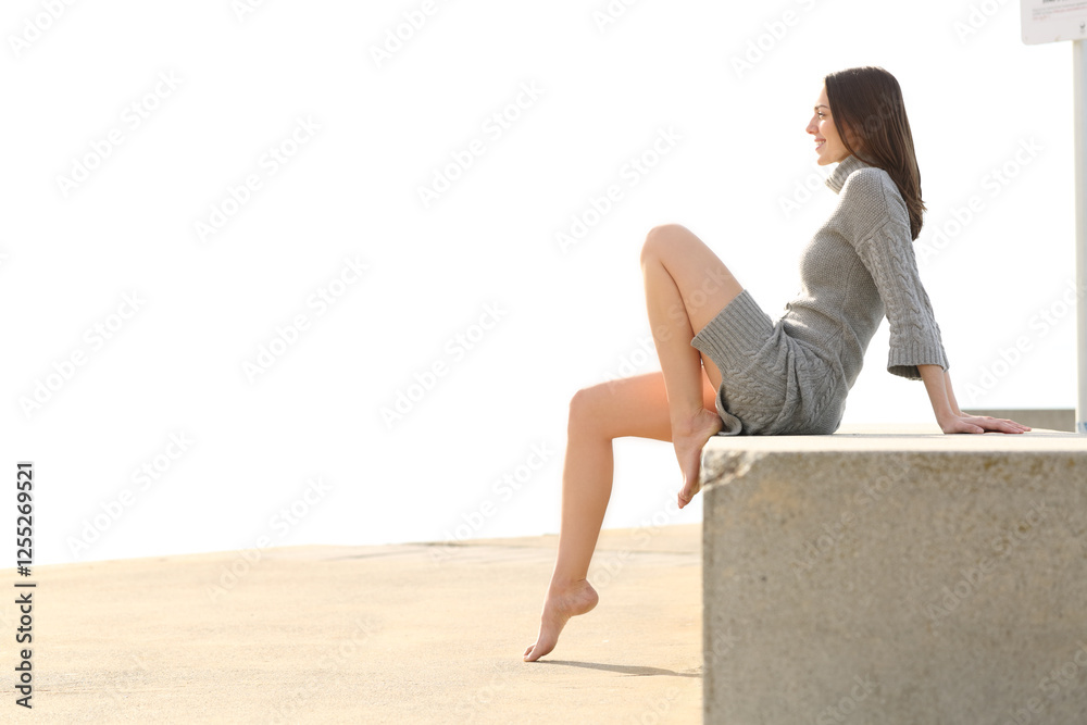 Beautiful woman showing long waxed legs in winter Beautiful woman showing long waxed legs in winter