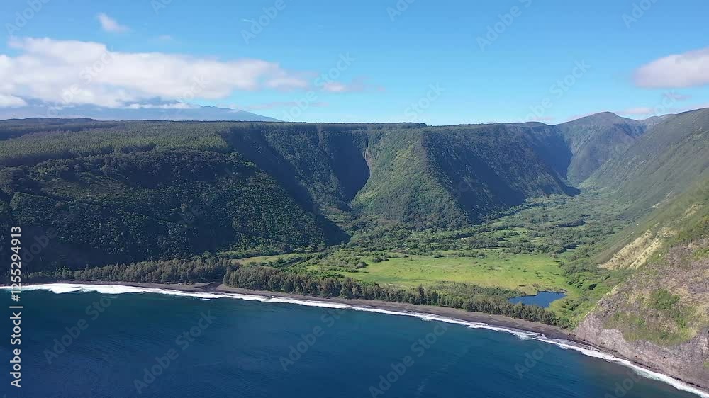 A breathtaking aerial view of Waipio Valley’s lush green cliffs, black sand shoreline, and deep blue ocean, creating a stunning tropical landscape. A breathtaking aerial view of Waipio Valley’s lush green cliffs, black sand shoreline, and deep blue ocean, creating a stunning tropical landscape.