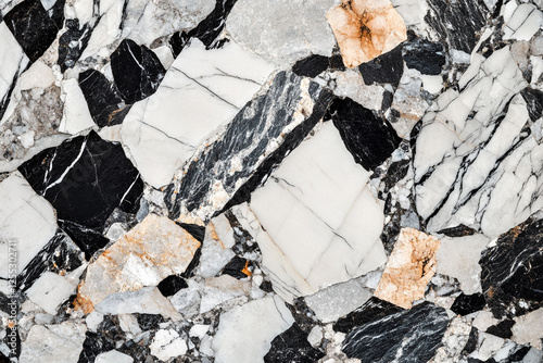 Granite texture with contrasting black, white and grey mineral inclusions photo