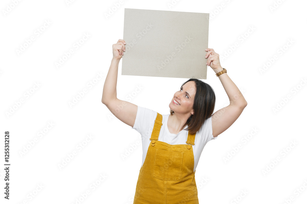 Smiling woman in yellow jumpsuit holds sign for text display in bright indoor setting Smiling woman in yellow jumpsuit holds sign for text display in bright indoor setting