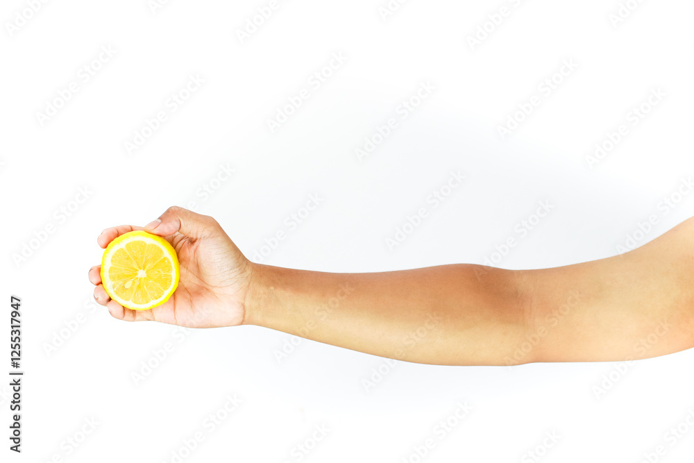 Holding a sliced lemon on white, sour yellow fruit, citrus and human Holding a sliced lemon on white, sour yellow fruit, citrus and human