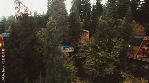 View of Cottage in the forest during sunset .