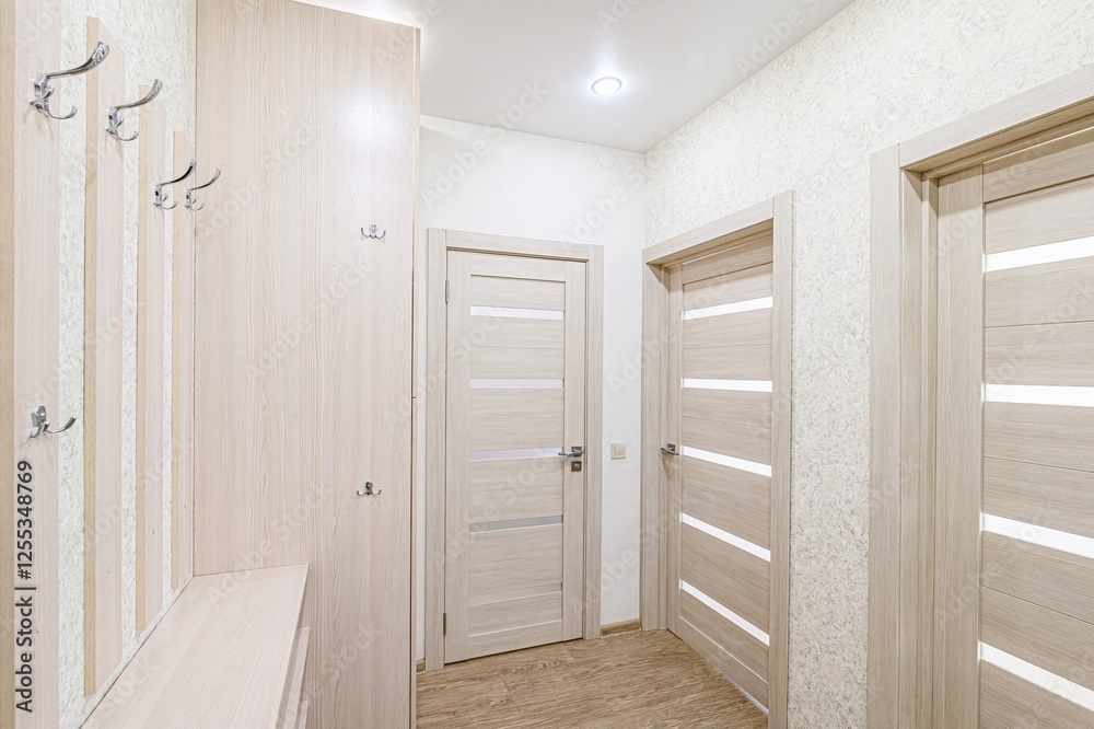 Fototapeta premium standard room interior apartment. room doors, renovation corridor lobby entrance hall