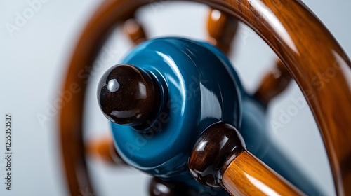 Close-up of a Exquisitely Crafted Wooden Ship Wheel with Teal Accents
