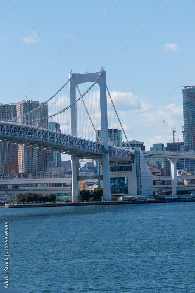 Rainbow bridge close up under the blue sky in Tokyo, Japan Rainbow bridge close up under the blue sky in Tokyo, Japan