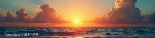 Majestic sunset over calm sea with puffy clouds, waves, golden, sea