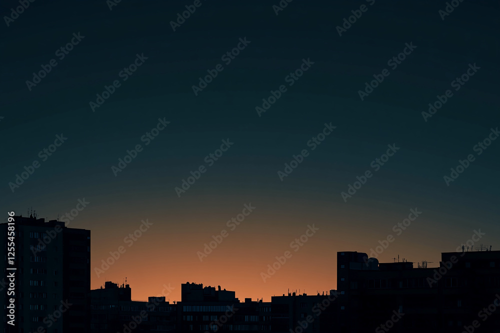 Silhouette of buildings at dusk, showcasing an urban cityscape with a gradient sky representing the transition from day to night. Silhouette of buildings at dusk, showcasing an urban cityscape with a gradient sky representing the transition from day to night.
