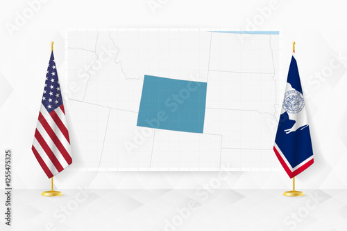 Map of Wyoming and flags of Wyoming on flag stand. photo