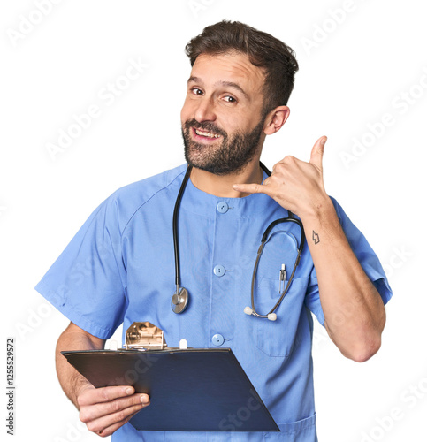 Hispanic male nurse with inventory showing a mobile phone call gesture with fingers.