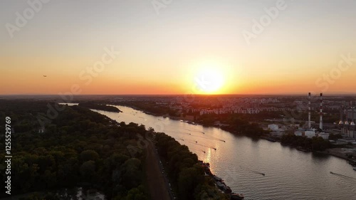 beautiful sunset with river in the city