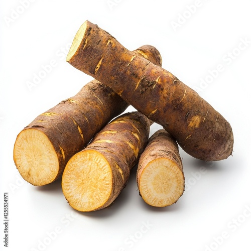 Stacked Yellow And Brown Yams On White Background