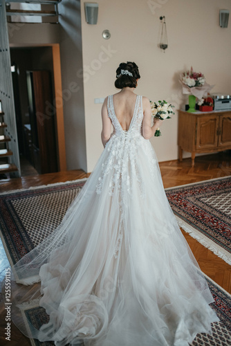 Excited bride in wedding with bouquet.
