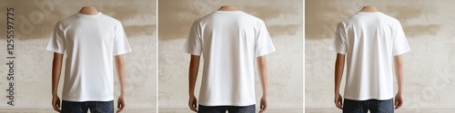 Three white t-shirts are shown in a row, with the back of the shirts visible. The shirts are all the same color and style, and they are all hanging on a wall. Concept of uniformity and simplicity