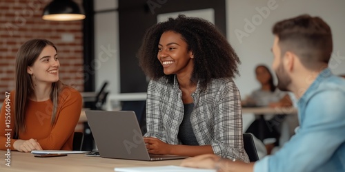 Diverse professionals collaborating and smiling around a table in a modern office