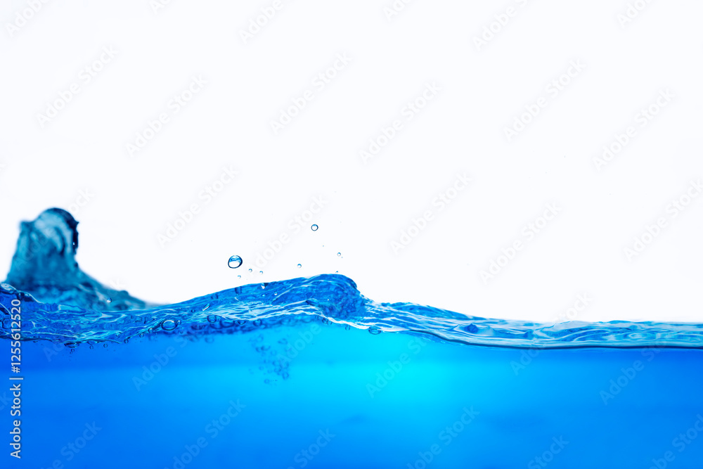 Closeup view of dynamic flowing blue water waves on white background. Liquid splash. Texture and abstract background Closeup view of dynamic flowing blue water waves on white background. Liquid splash. Texture and abstract background