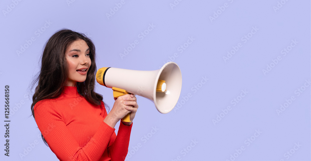 Young woman enthusiastically using a megaphone against purple background Young woman enthusiastically using a megaphone against purple background