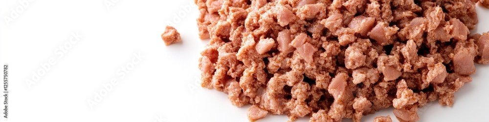 A close-up view of meat on a white surface, ideal for food photography or culinary applications