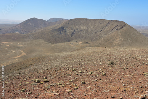 High-angle view to an extinct volcano in the nature park Caminos Naturales, Fuerteventura, Canary Islands