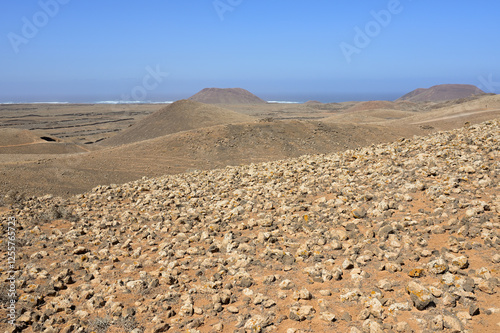 Hike in the nature park Caminos Naturales to the volcanes de Bayuyo, Fuerteventura, Canary Islands photo