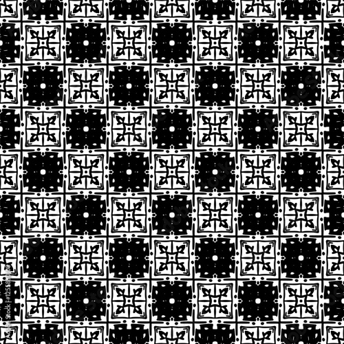 Seamless black and white geometric pattern with hand-drawn ornamental details. This bold, symmetrical tile design features alternating squares with floral and decorative elements, vintage 