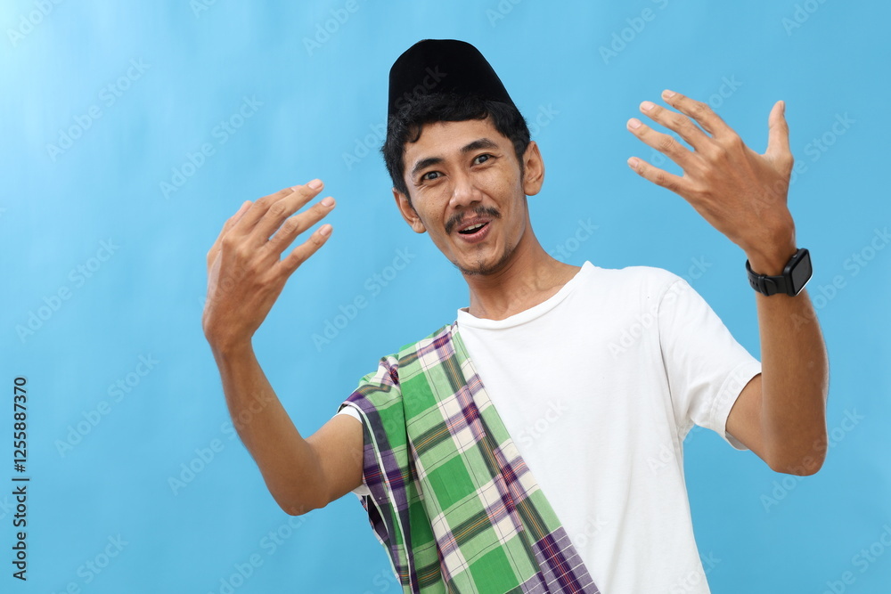 Fototapeta premium Asian muslim man asks join him, beckons with inviting hand hugs gesture. He is playful, flirtatious, inviting to come