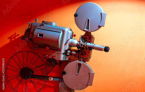 a beautiful reel projector of old films from old cinemas