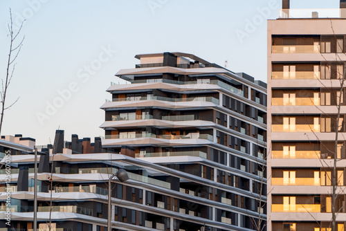 Modern apartment buildings at sunset