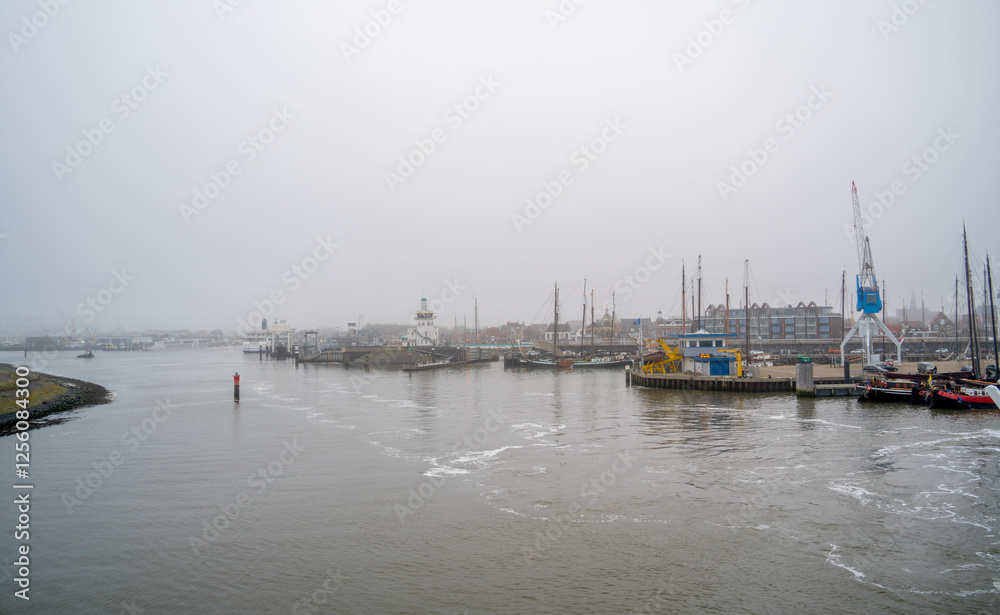 Foggy winter morning in the port of Harlingen, Netherlands
Foggy winter morning in the port of Harlingen, Netherlands