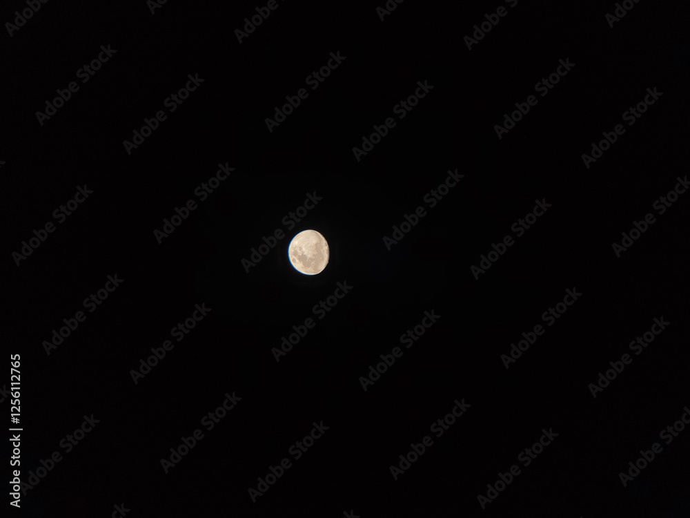 view of the moon in the dark sky view of the moon in the dark sky