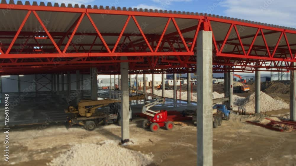 A Construction Site Featuring Large Piles of Gravel Alongside Various Types of Equipment A Construction Site Featuring Large Piles of Gravel Alongside Various Types of Equipment