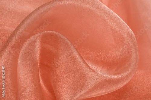 Orange organza fabric texture background