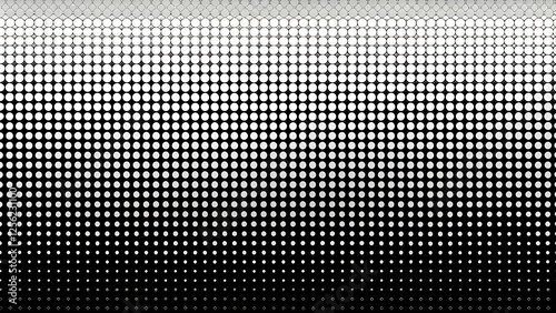 Abstract Halftone Gradient with Dispersing Dots in Monochrome photo