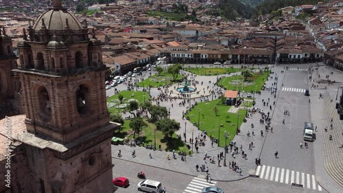 Plaza de armas in cusco, peru, showing tourists walking around