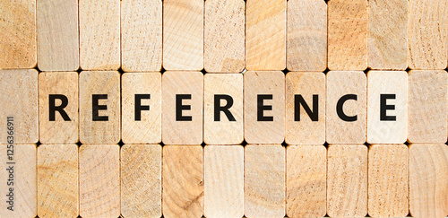 Reference symbol. Concept word Reference on beautiful wooden blocks. Beautiful wooden blocks background. Business reference concept. Copy space.