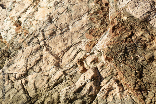 Beige-brow, Ocher background from a rock structure on the coast in Budva, Montenegro. High quality photo