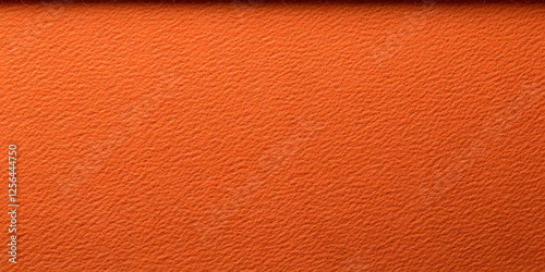 Orange Textured Surface: Close-up of a vibrant orange material with a textured pattern, showcasing depth and warmth in its color and design.