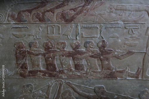 Reliefs from the tomb of Ptahhotep showing daily activities such as offerings, hunting, fishing and agricultural activities and sports in Saqqara in Egypt	