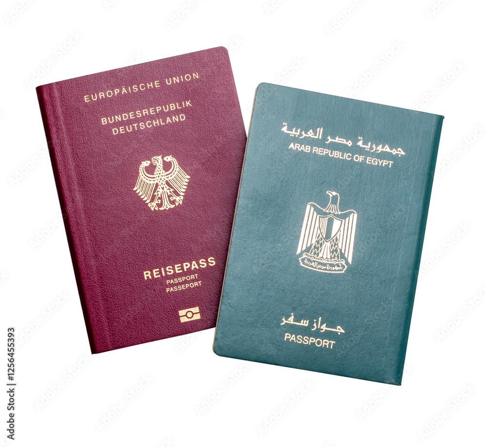German and Egyptian Passports, Migration Concept, on White Background German and Egyptian Passports, Migration Concept, on White Background