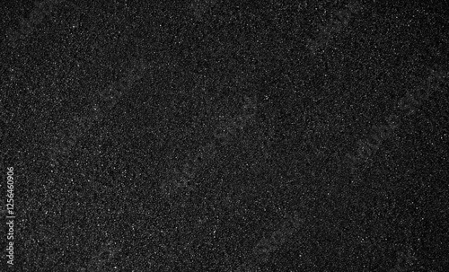 Fototapeta Naklejka Na Ścianę i Meble -  Black foam texture as background. Black foam surface, top view, flat lay