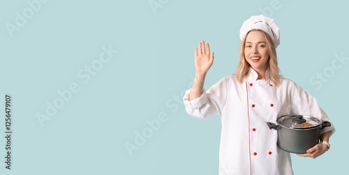 Beautiful young female chef...