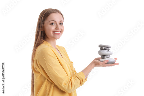 Young woman with spa stones...