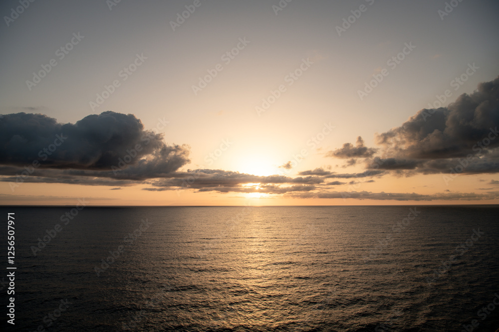 sunset over the sea near Santorini, Greece sunset over the sea near Santorini, Greece