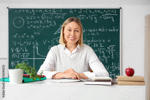 Mature female math teacher ...