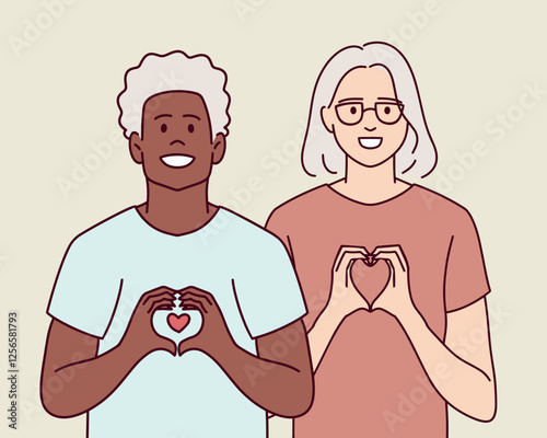  Elderly interracial couple smiles while forming a heart shape with hands. They express love, unity, and happiness.