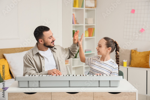 Teenage girl with tutor and...