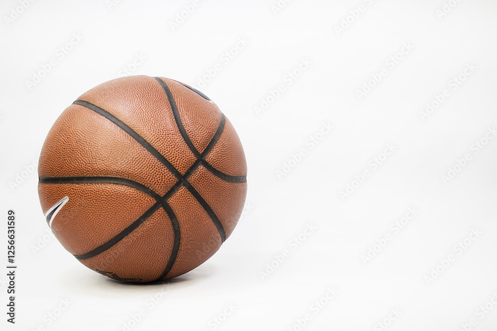 Basketball Ball on the left, with white background. Basketball Ball on the left, with white background.