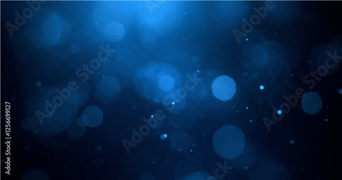 Blue glow particles with soft bokeh effect on dark abstract backgroun