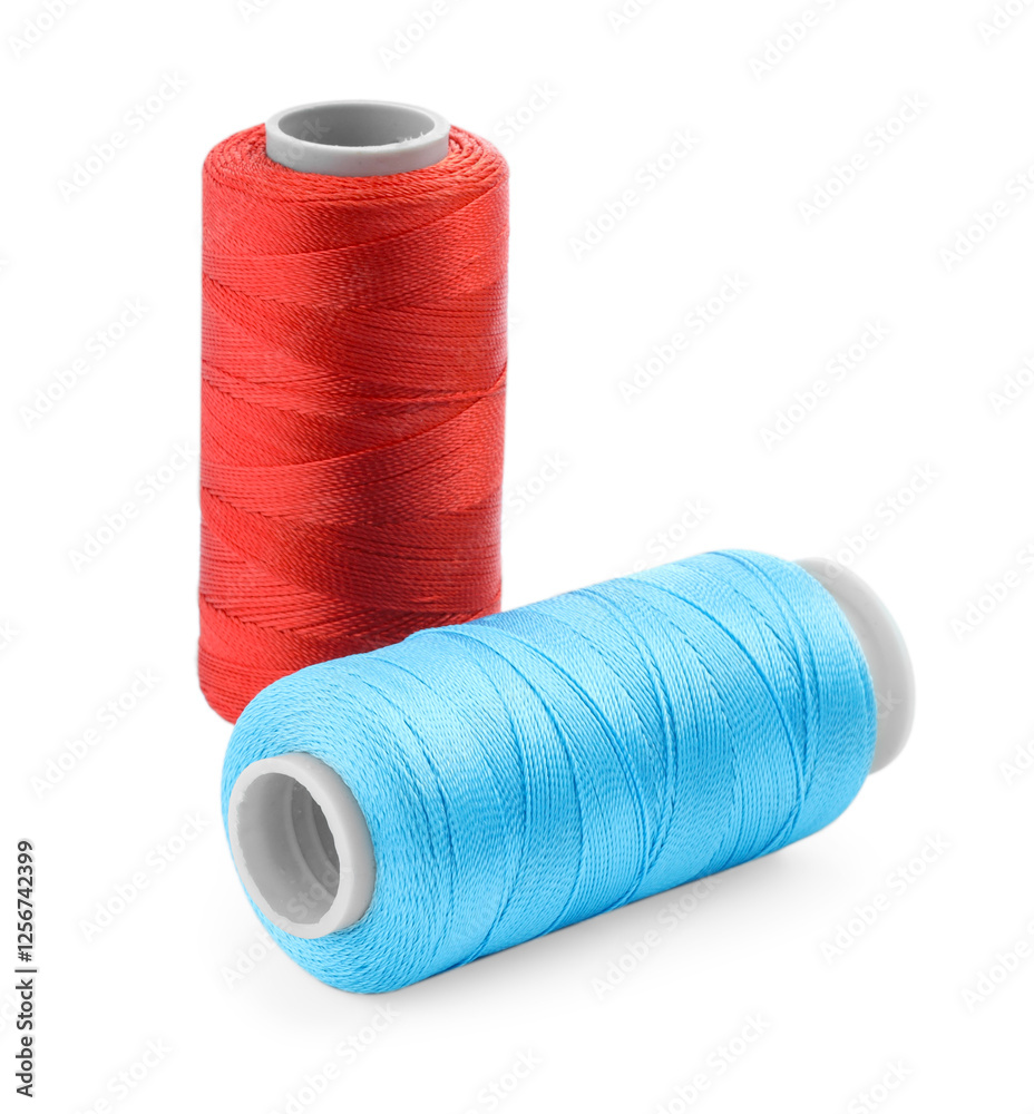 Spools of bright sewing threads isolated on white Spools of bright sewing threads isolated on white
