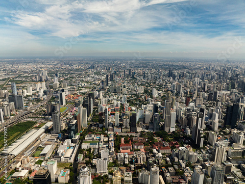 Photography Panoramic view of Bangkok showcasing skyscrapers, modern architecture, and clear skies above the bustling urban area